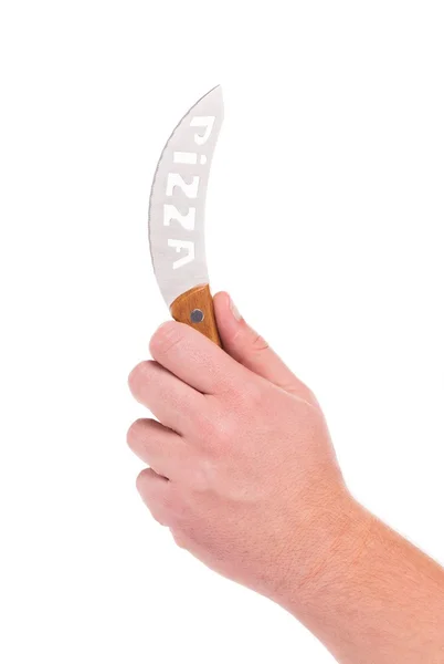 Hand holds pizza's knife. — Stock Photo, Image