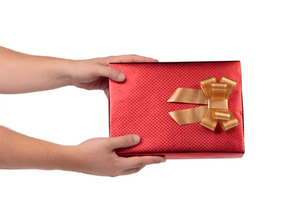Красная Подарочная Коробка Золотым Бантом Руке Изолированный Белом Фоне Крупный — стоковое фото