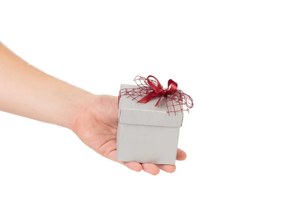 Geschenkdoos Met Rode Strik Hand Geïsoleerd Witte Achtergrond Close — Stockfoto