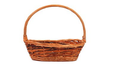 Wicker basket made of willow branches. Isolated over white background. Close-up.