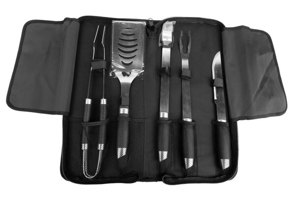 Set of tools for bbq in black bag. Isolated over white background. Close-up.