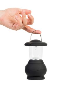 Beyaz arka planda izole edilmiş kamp için siyah LED fener. Yeniden şarj edilebilir ışıklandırma.