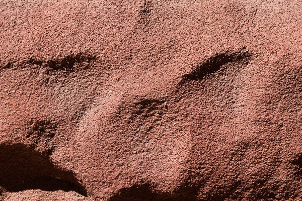 Roter Handwerklicher Stein Aus Beton Nimmt Die Gesamte Bildoberfläche Ein — Stockfoto