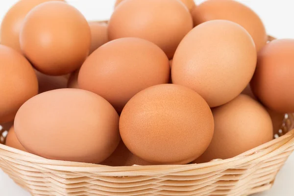 Fresh Eggs Wicker Basket Located White Surface Close — Fotografia de Stock