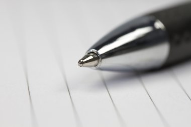 üzerinde bir not defteri kalem kapatmak