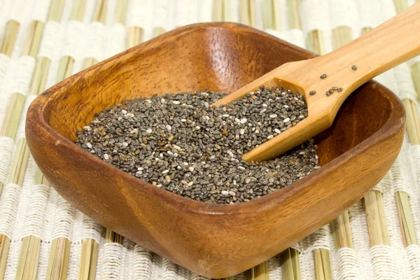 Seeds on wooden spoon — Stock Photo, Image