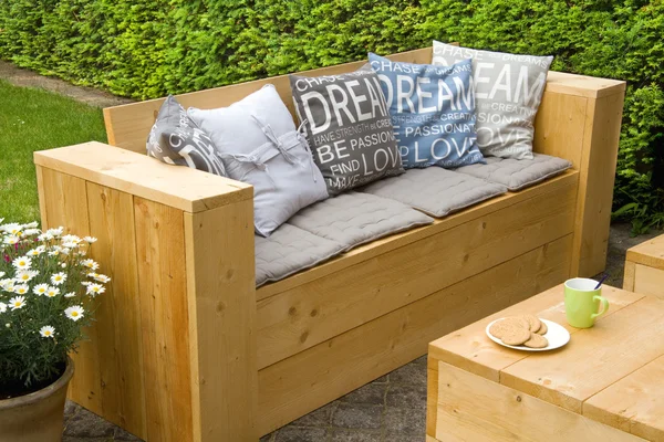 Garden bench in backyard — Stock Photo, Image