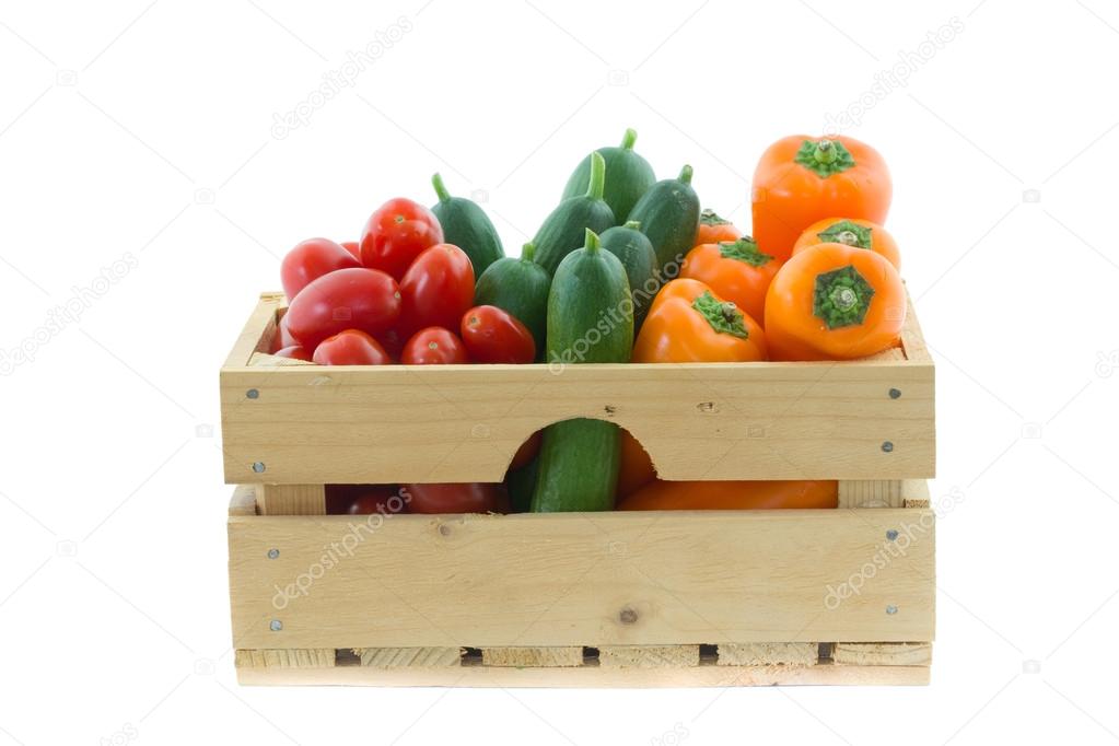 wooden crate with colorful vegetables
