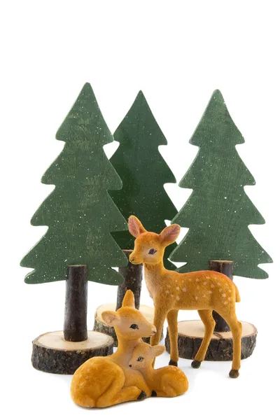 Trois jouets de cerf avec des pins en bois — Photo