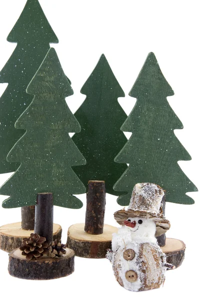 Boneco de neve com pinheiro no fundo — Fotografia de Stock