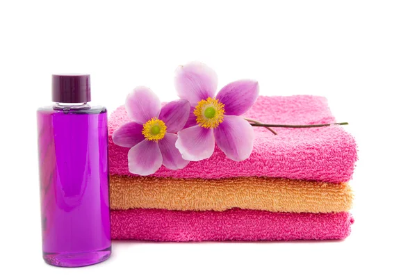 Two anemones on pink and orange towels — Stock Photo, Image