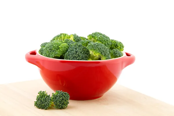Red bowl with broccoli — Stock Photo, Image