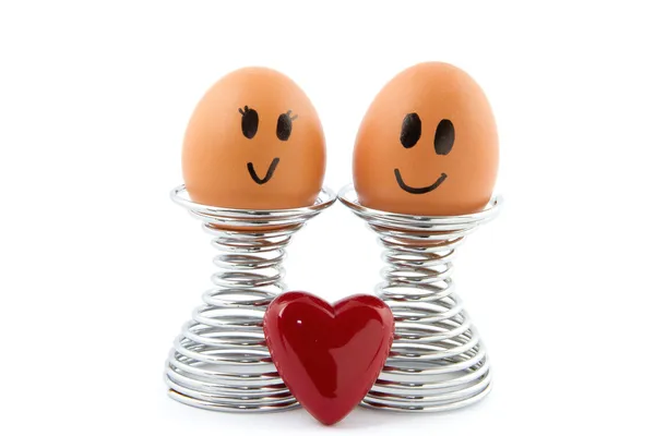 Due uova in uovo titolare in amore Foto Stock
