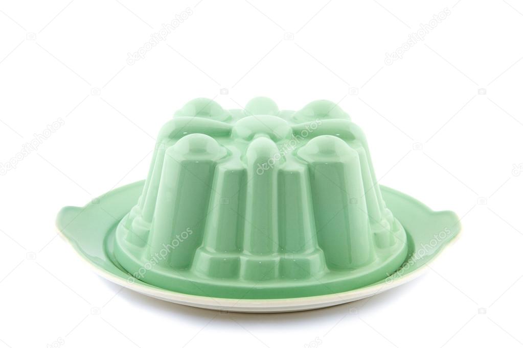 green vintage pudding mold on white background