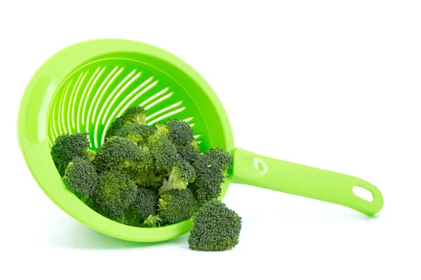 Broccoli in a colander isolated — Stock Photo, Image