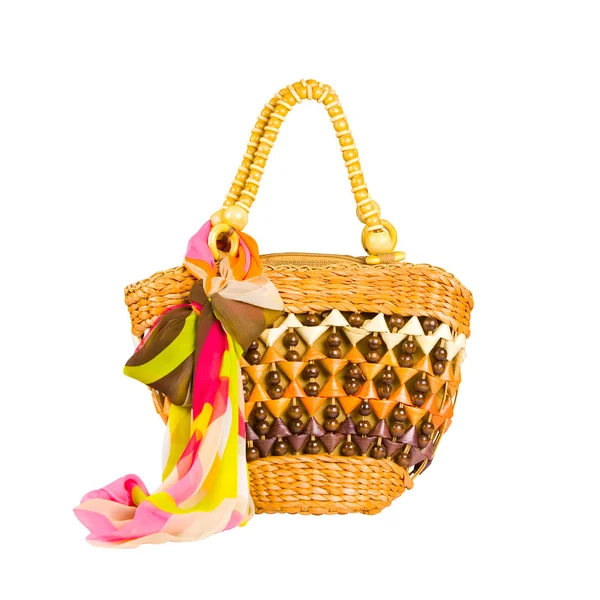 Yellow wicker beach bag with bow isolated on a white background — Stock Photo, Image