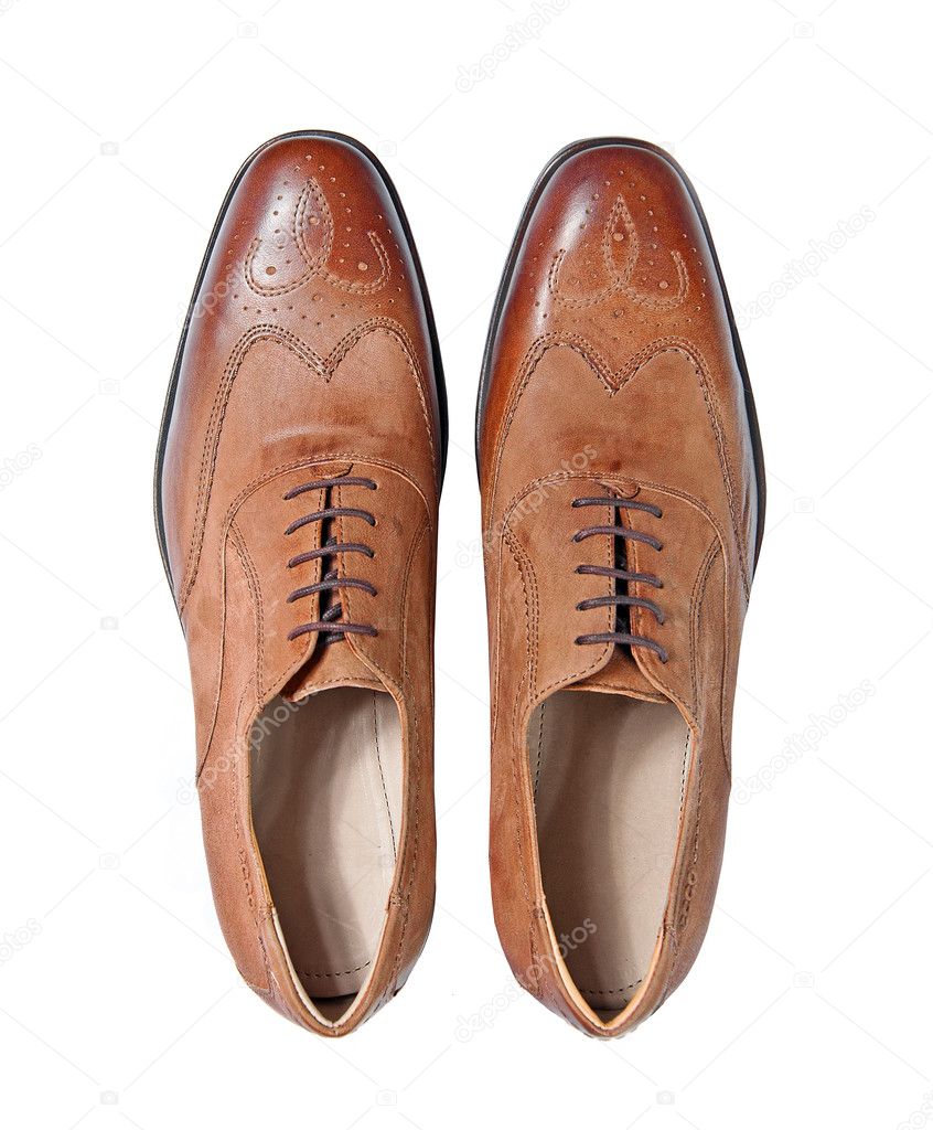 Men brown leather shoes isolated on a white studio background