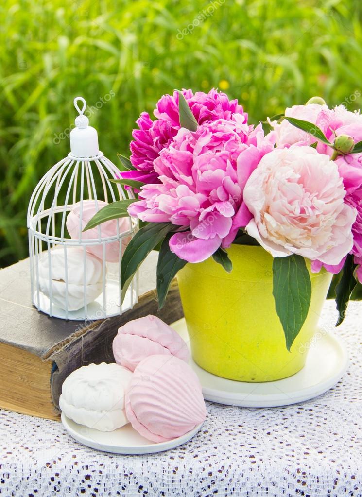 Sweet marshmallows and blooming peonies