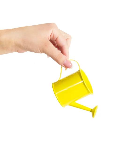 Female hand holding a watering can isolated on white background — Stock Photo, Image