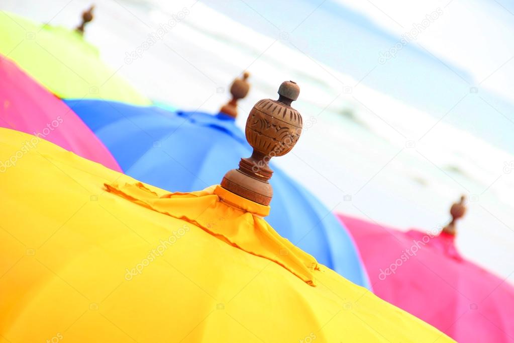 Top of a Colorful Beach Umbrella against the Sky