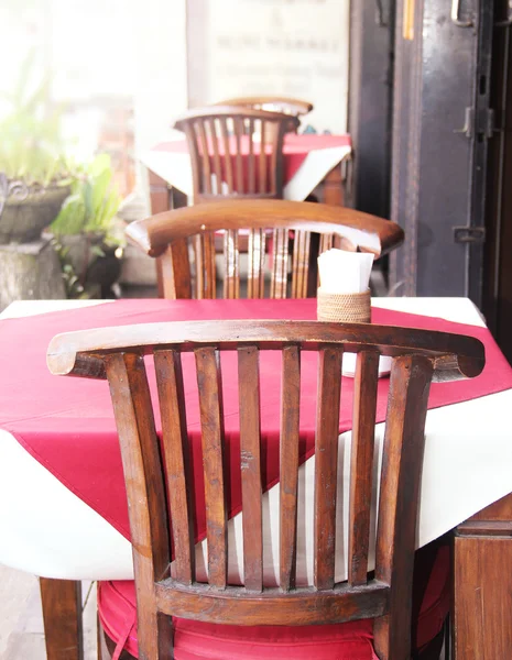 Table on cafe background — Stock Photo, Image