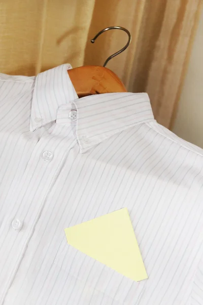 Paper blank in the classic shirt pocket with space for text — Stock Photo, Image