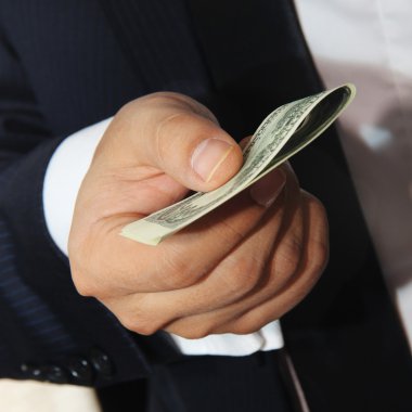 para sizin için teklif 100 dolar tutan işadamları