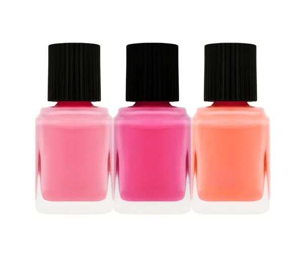 Smalto per unghie bottiglia di diversi colori isolato su dorso biancogr — Foto Stock
