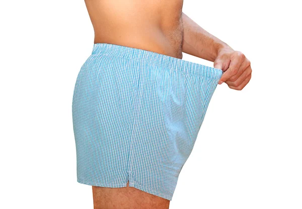 在寻找的东西的内裤的男人 — 图库照片