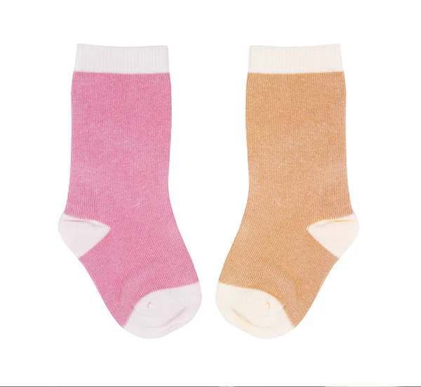 Beyaz zemin üzerinde izole farklı bebek çorap — Stok fotoğraf