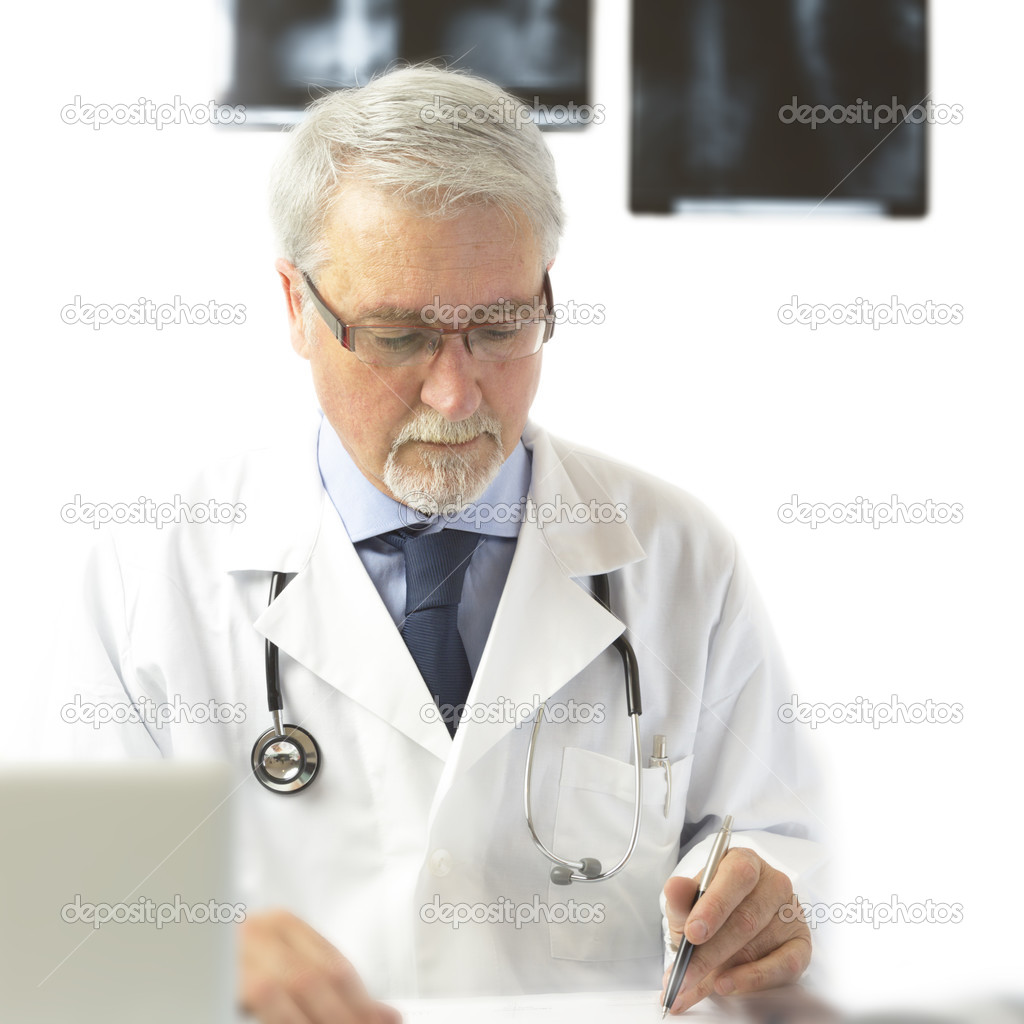 Doctor writing a prescription, on the white background with x-ra