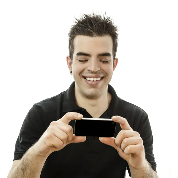 Mutlu genç adam onun smartphone vasıl arıyorsunuz — Stok fotoğraf