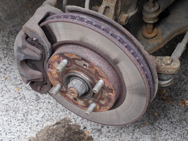 Car wheel repair and brake pad replacement