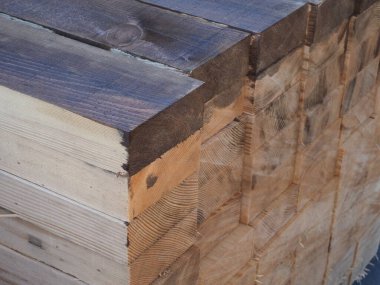 Stacked wooden boards for construction