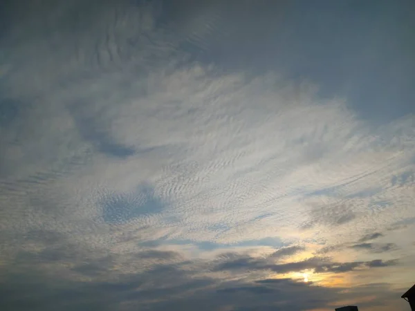 Sunset Light Gray Clouds Glimpses Blue Sky — Stock Photo, Image