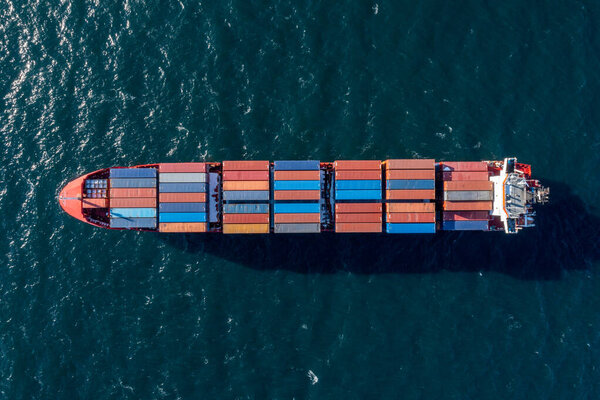 Top view of a container ship at sea.