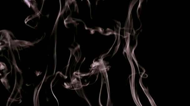 Smoke was filmed in slow motion and close-up. — Stock Video