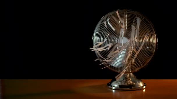 Rotation Fan Blades Creates Cool Breeze Flutters Sheets Paper — Stock Video