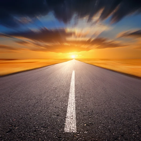 Motion blurred empty asphalt road — Stock Photo, Image