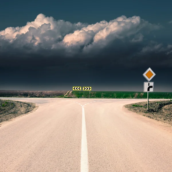 Crossroad with signs of priority of passage — Stock Photo, Image