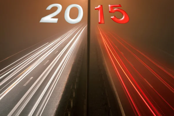 Night traffic on a highway forward to upcoming new year — Stock Photo, Image