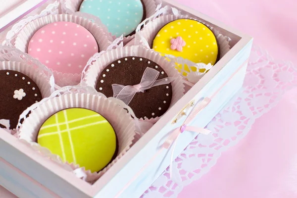 Colorful cookies in wooden box — Stock Photo, Image