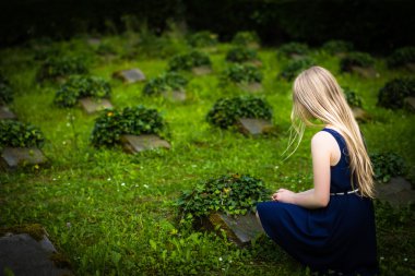 Mourning girl at war grave clipart