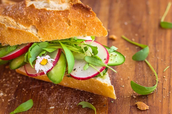 Baguette with green pesto — Stock Photo, Image