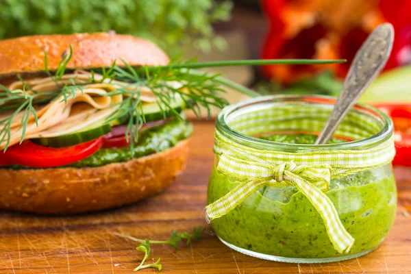 Green pesto in little jar — Stock Photo, Image