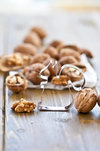 Walnut on a white paperbag — Stock Photo, Image