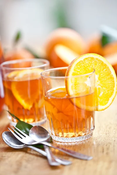 Homemade lemonade, ice tea with fresh oranges — Stock Photo, Image