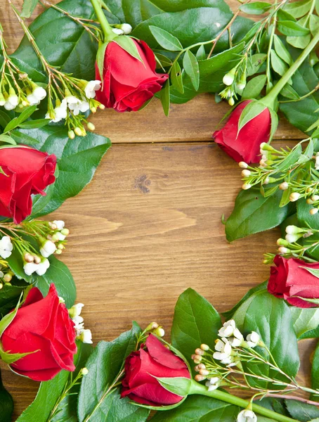 Frame made from roses and leaves — Stock Photo, Image