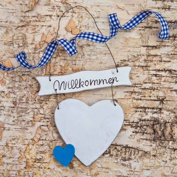 Heart with welcome written in german — Stock Photo, Image