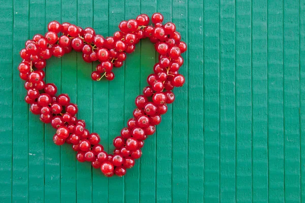 Red currant in heart-shape — Stock Photo, Image